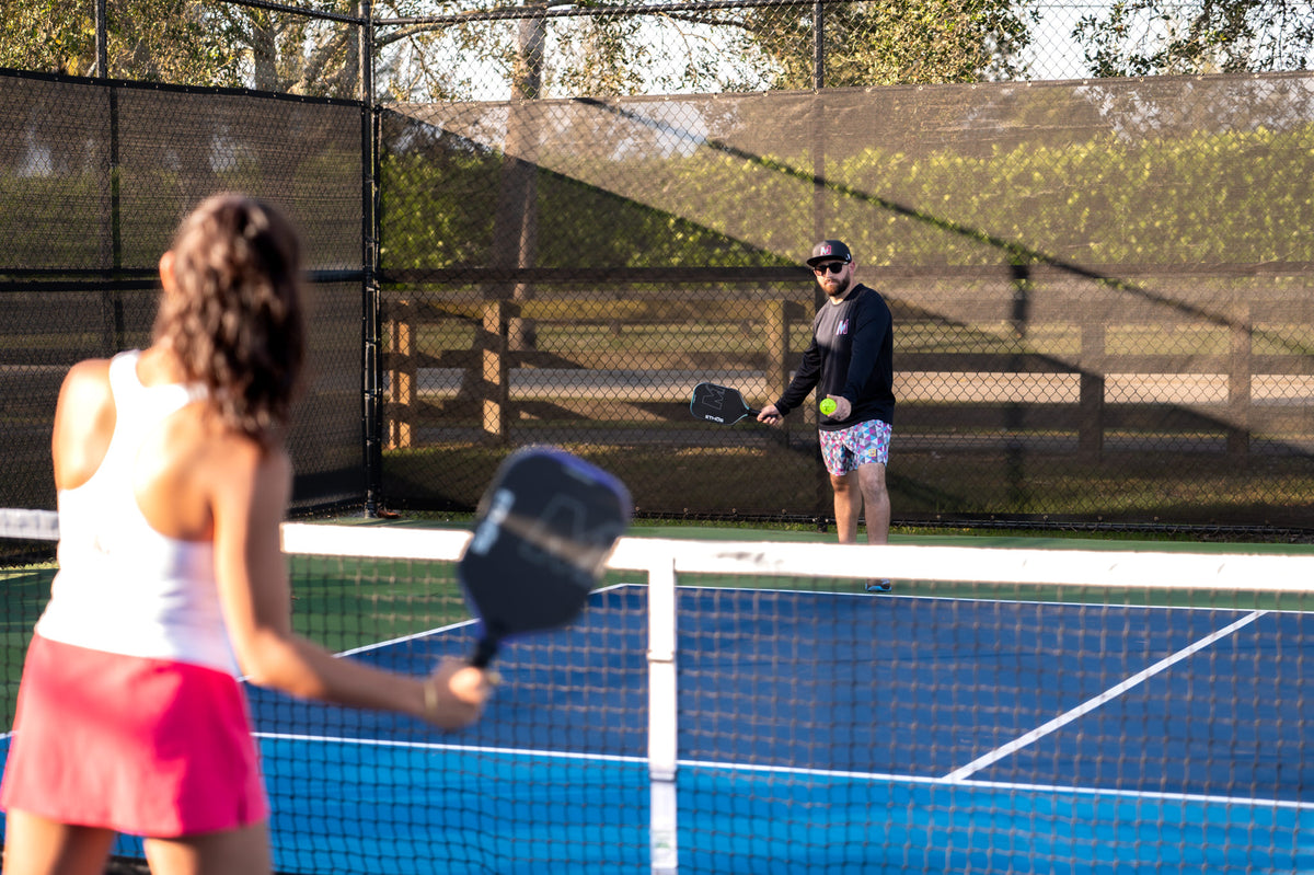 Pickleball players on court